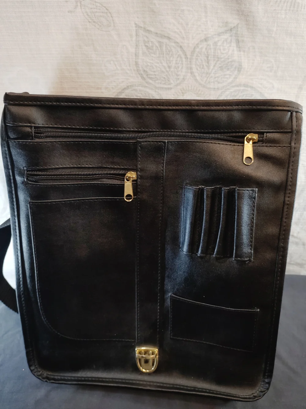 Classic Black Leather Messenger Bag with Gold-tone Hardware